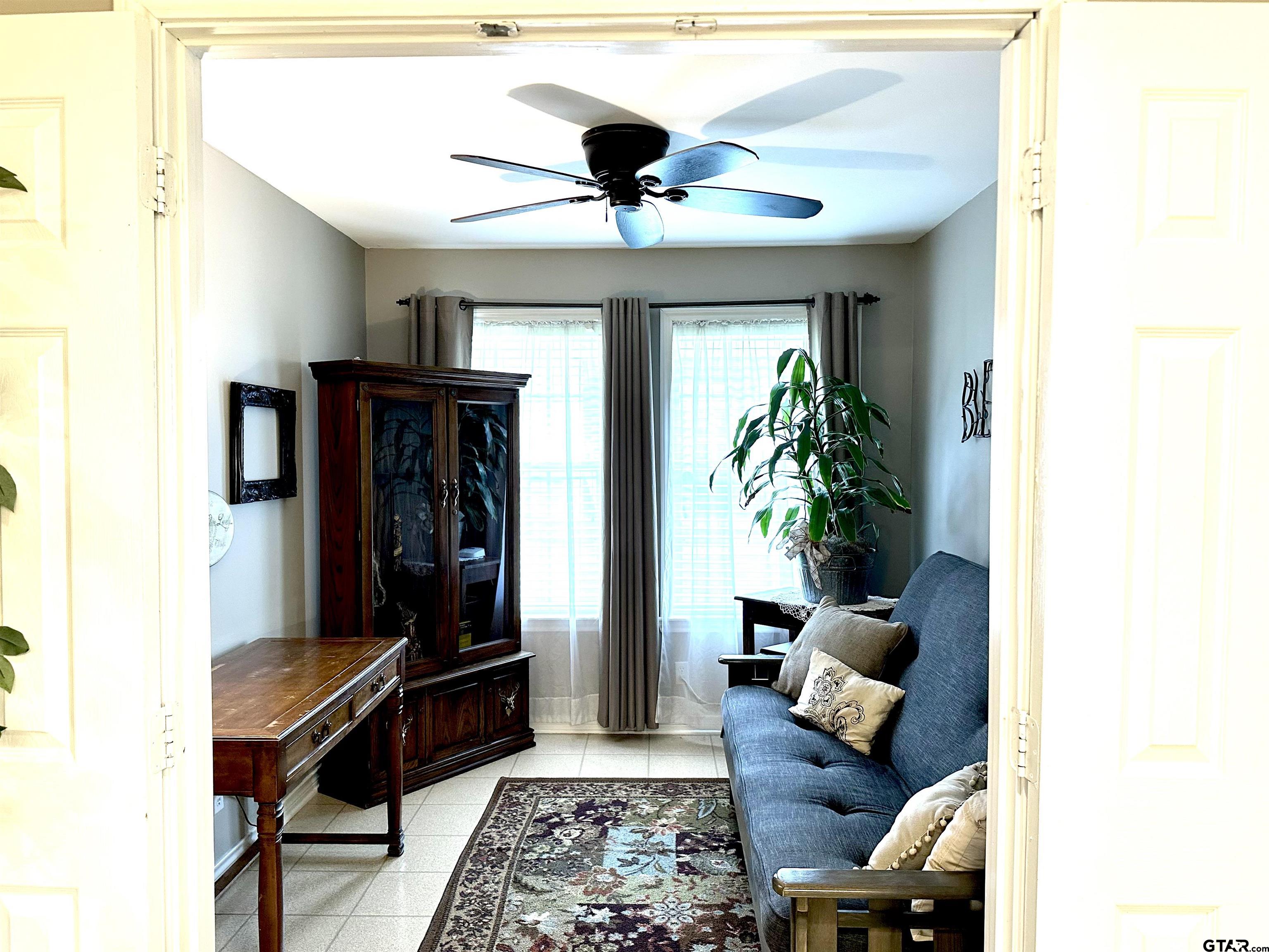 142 Parrish Rusk, TX 75785 - Photo 18 of 48 a living room with furniture and a potted plant