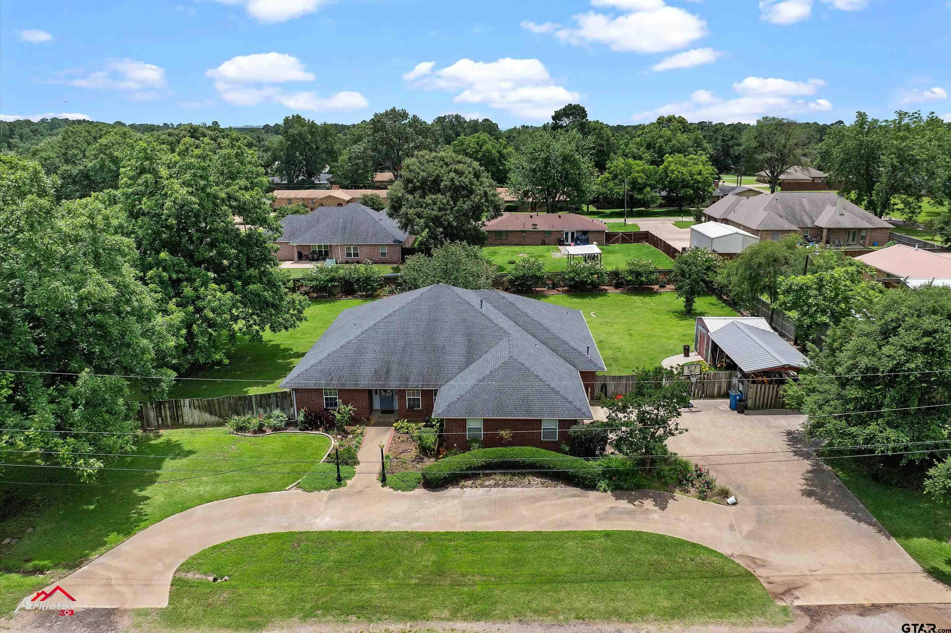 142 Parrish Rusk, TX 75785 - Photo 2 of 48 a aerial view of a house with yard and green space