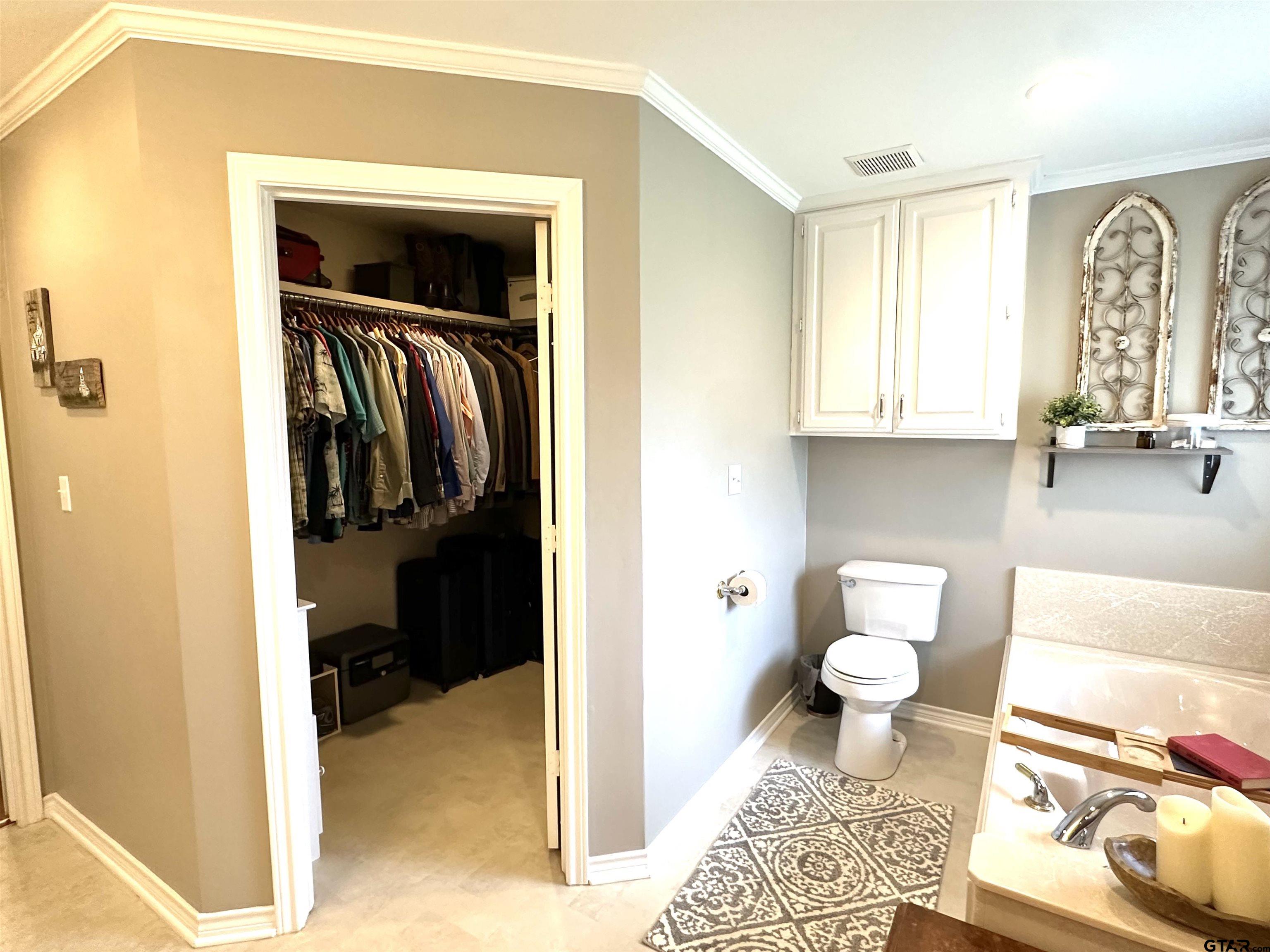 142 Parrish Rusk, TX 75785 - Photo 22 of 48 a bathroom view with a toilet a sink and a window
