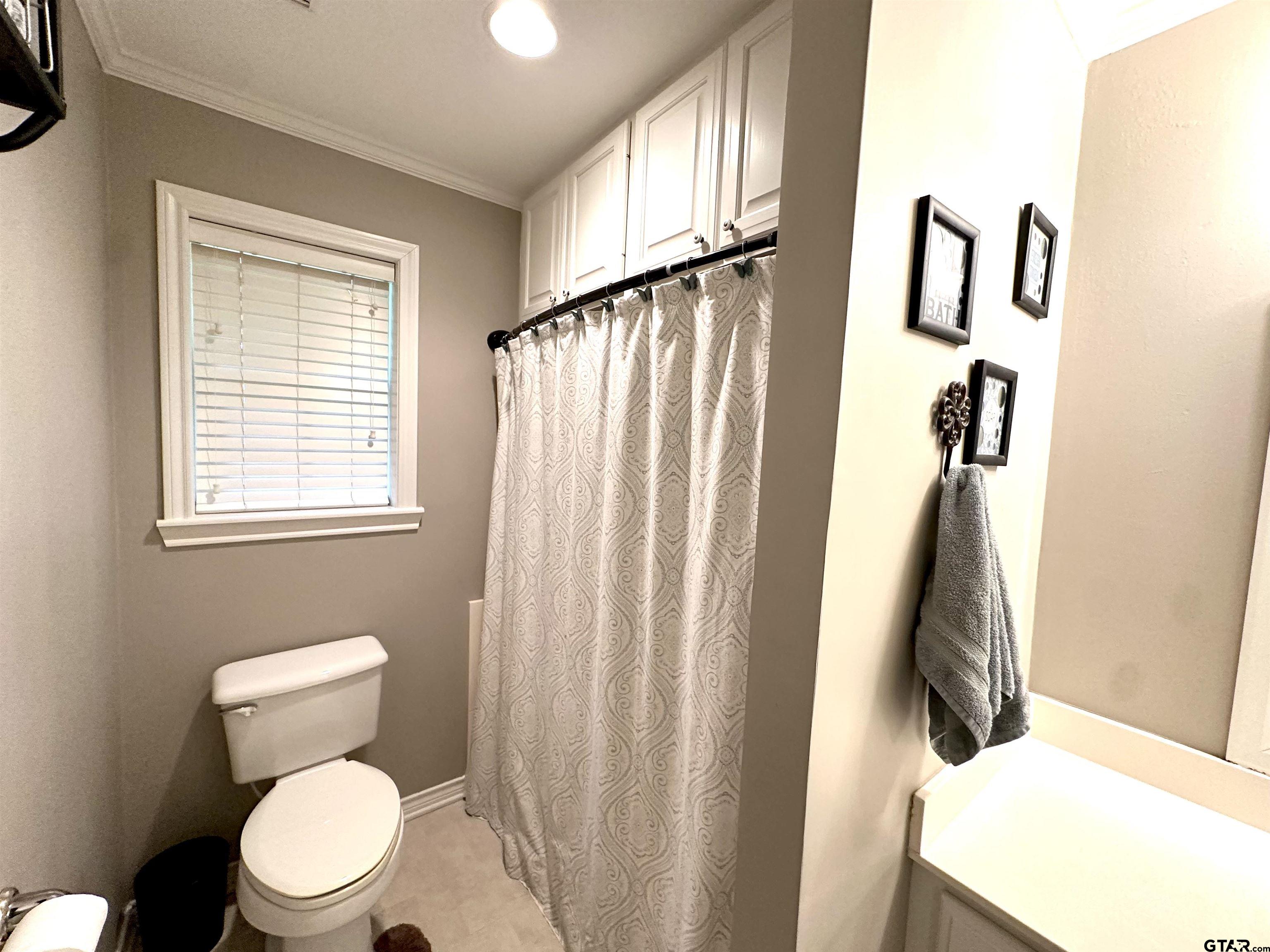142 Parrish Rusk, TX 75785 - Photo 28 of 48 a bathroom with a toilet and a sink
