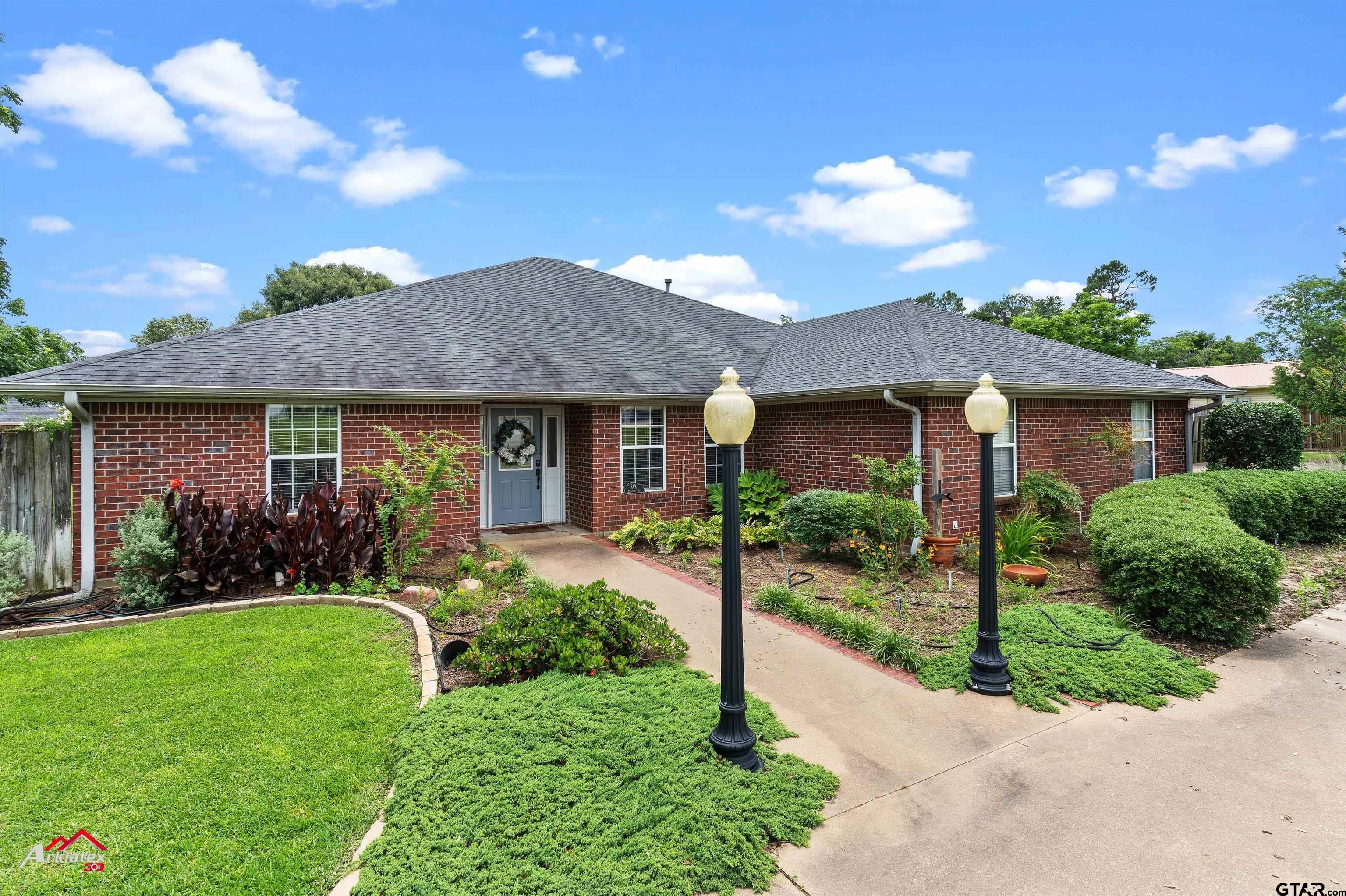 142 Parrish Rusk, TX 75785 - Photo 3 of 48 a front view of a house with a yard
