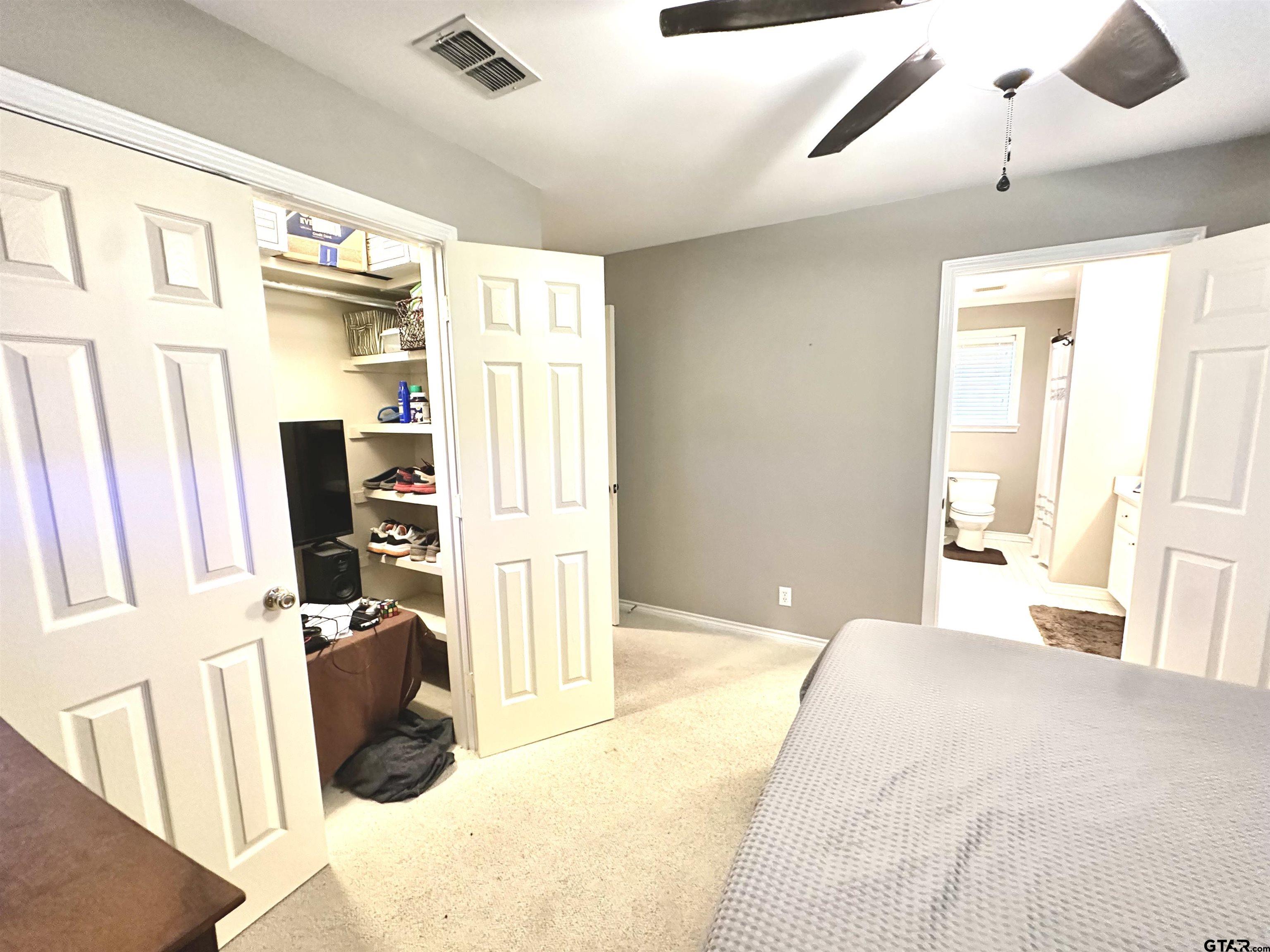 142 Parrish Rusk, TX 75785 - Photo 39 of 48 a bedroom with a bed next to a window