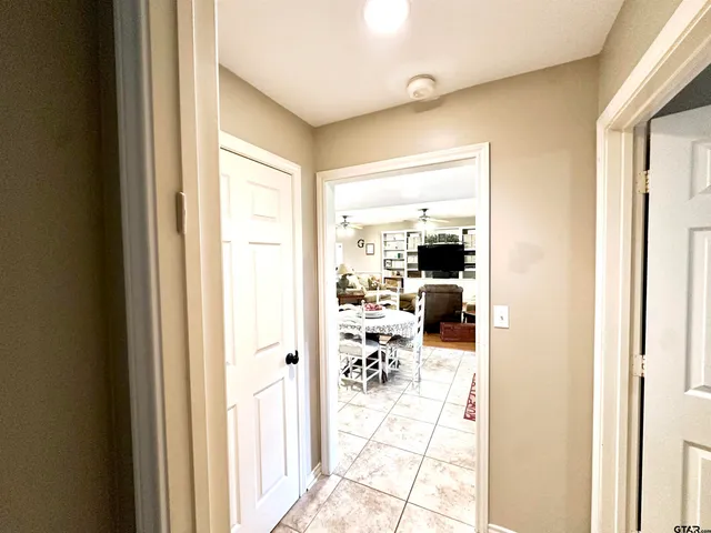 a picture of a living room with a large window
