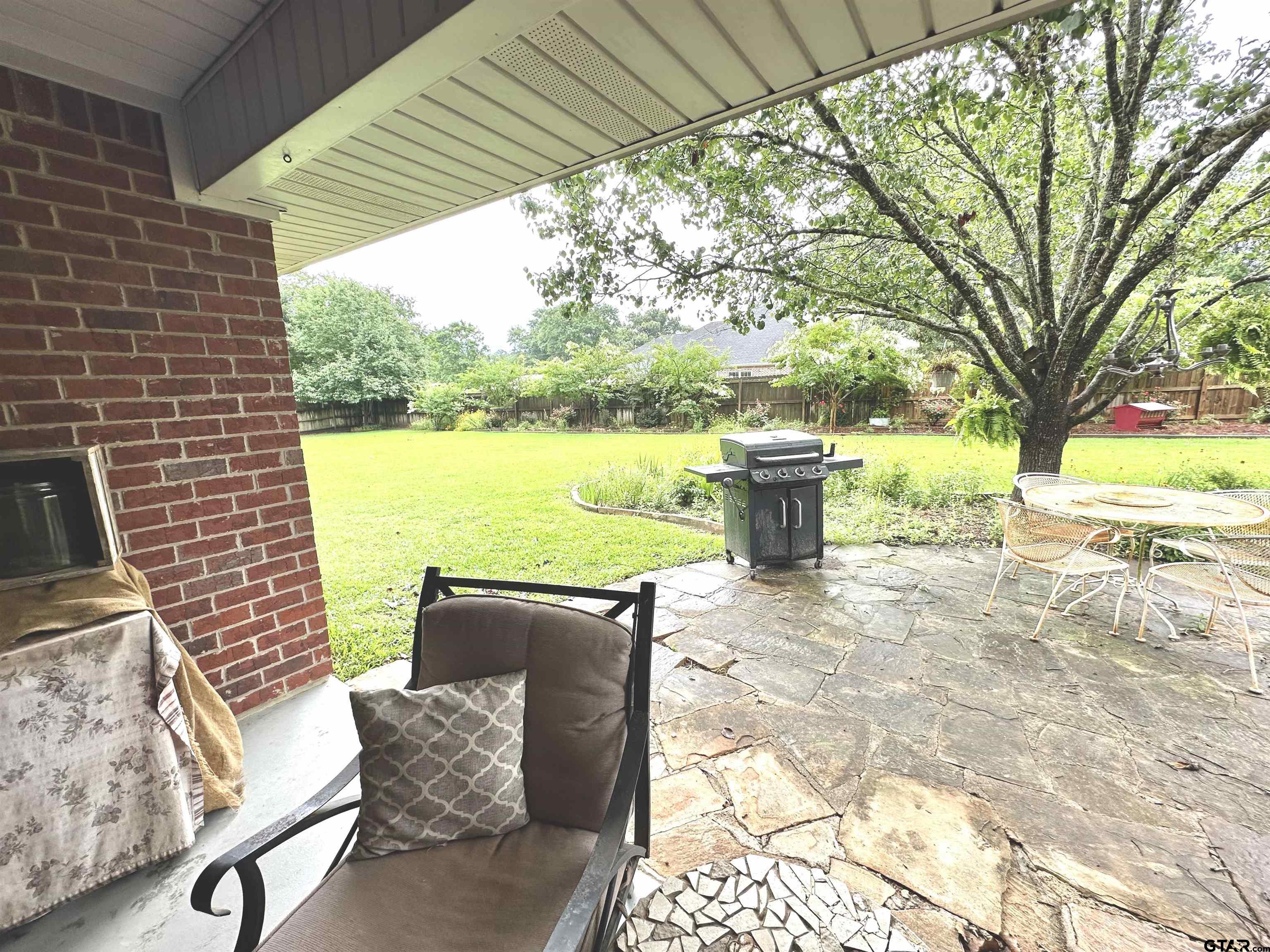 142 Parrish Rusk, TX 75785 - Photo 43 of 48 a view of a patio with chairs and a table