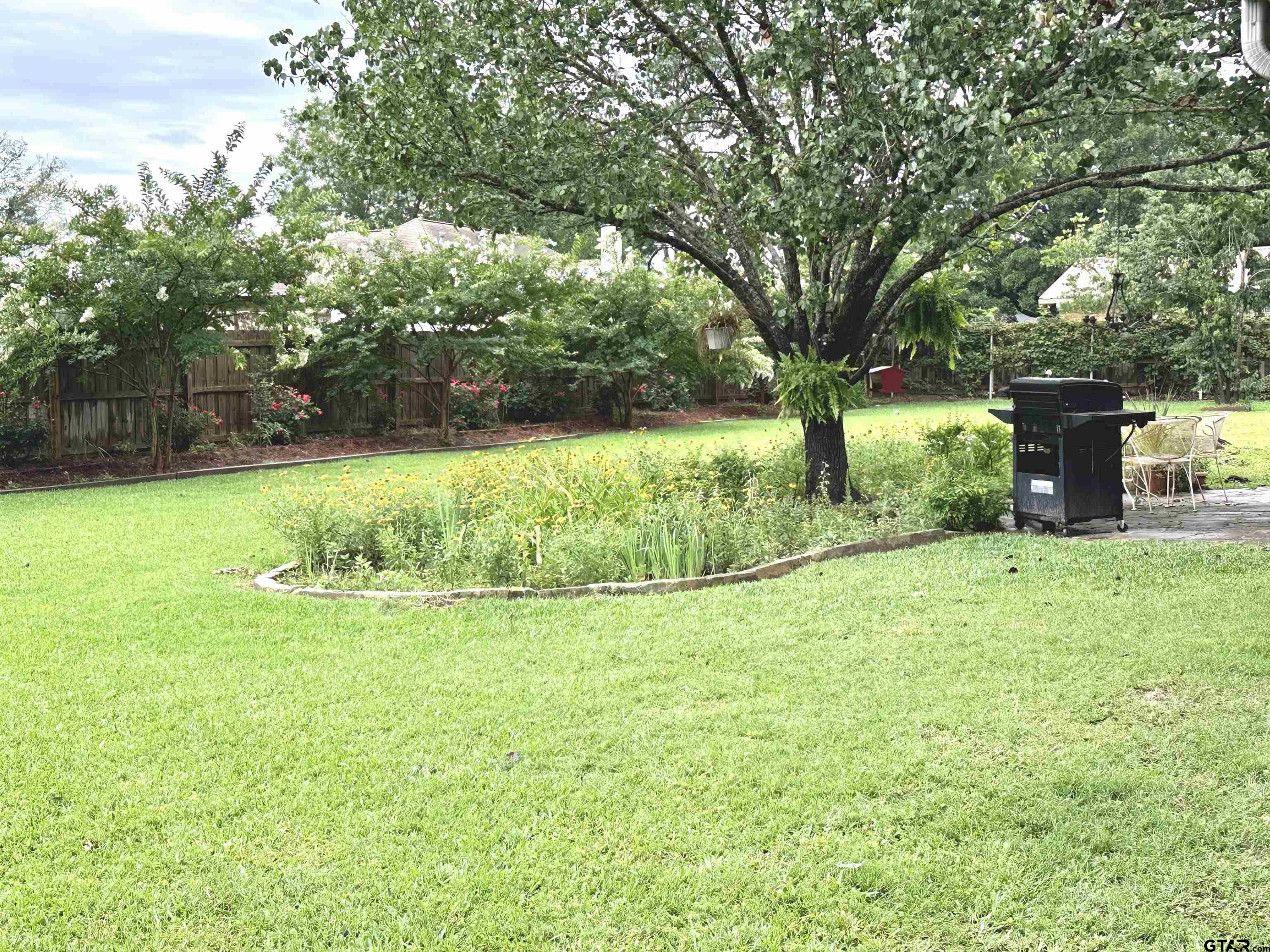 142 Parrish Rusk, TX 75785 - Photo 44 of 48 a view of a yard with a tree
