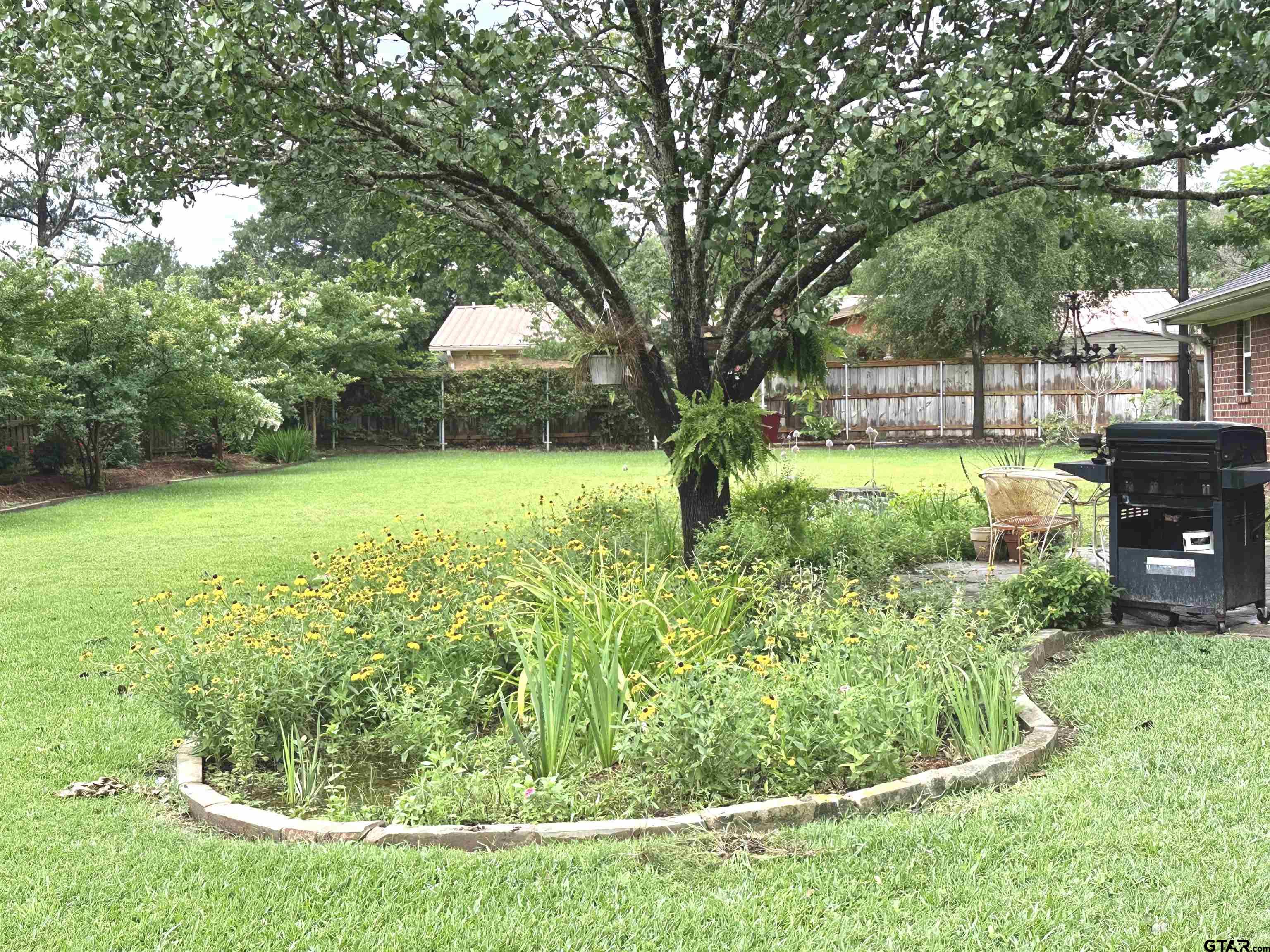 142 Parrish Rusk, TX 75785 - Photo 45 of 48 a view of a backyard with large trees