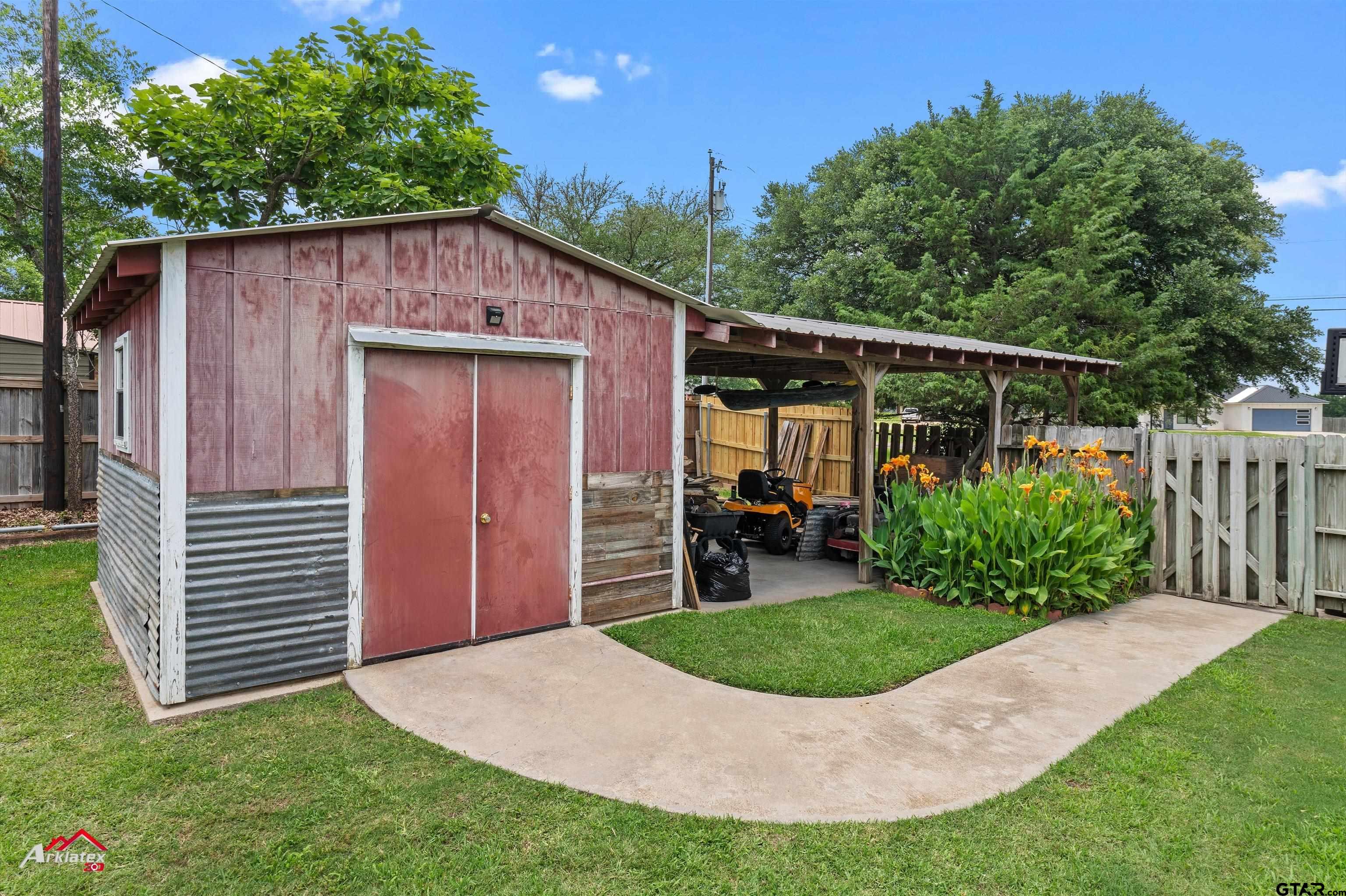 142 Parrish Rusk, TX 75785 - Photo 48 of 48 a view of a house with backyard and porch