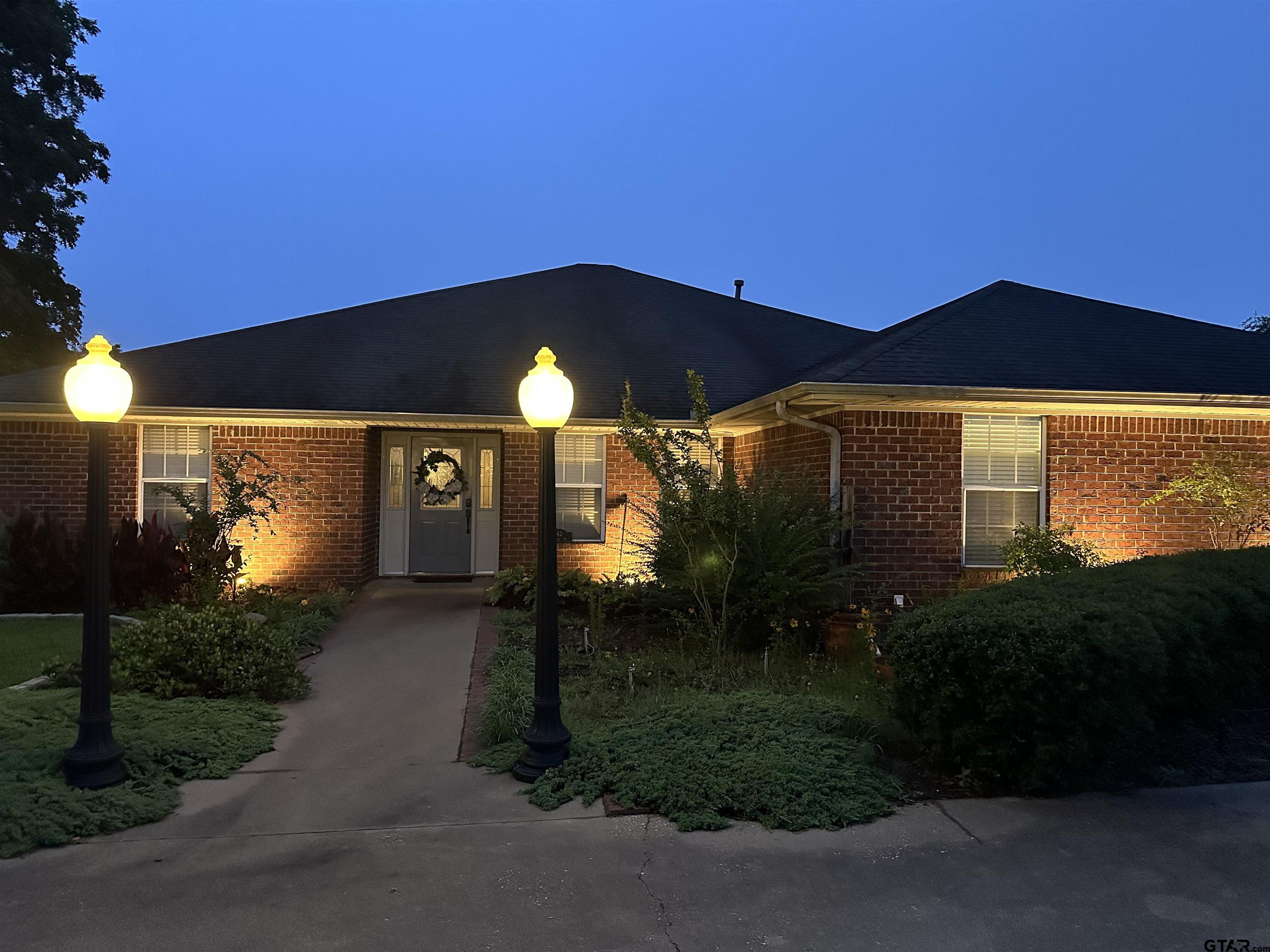 142 Parrish Rusk, TX 75785 - Photo 8 of 48 a front view of house with yard and green space