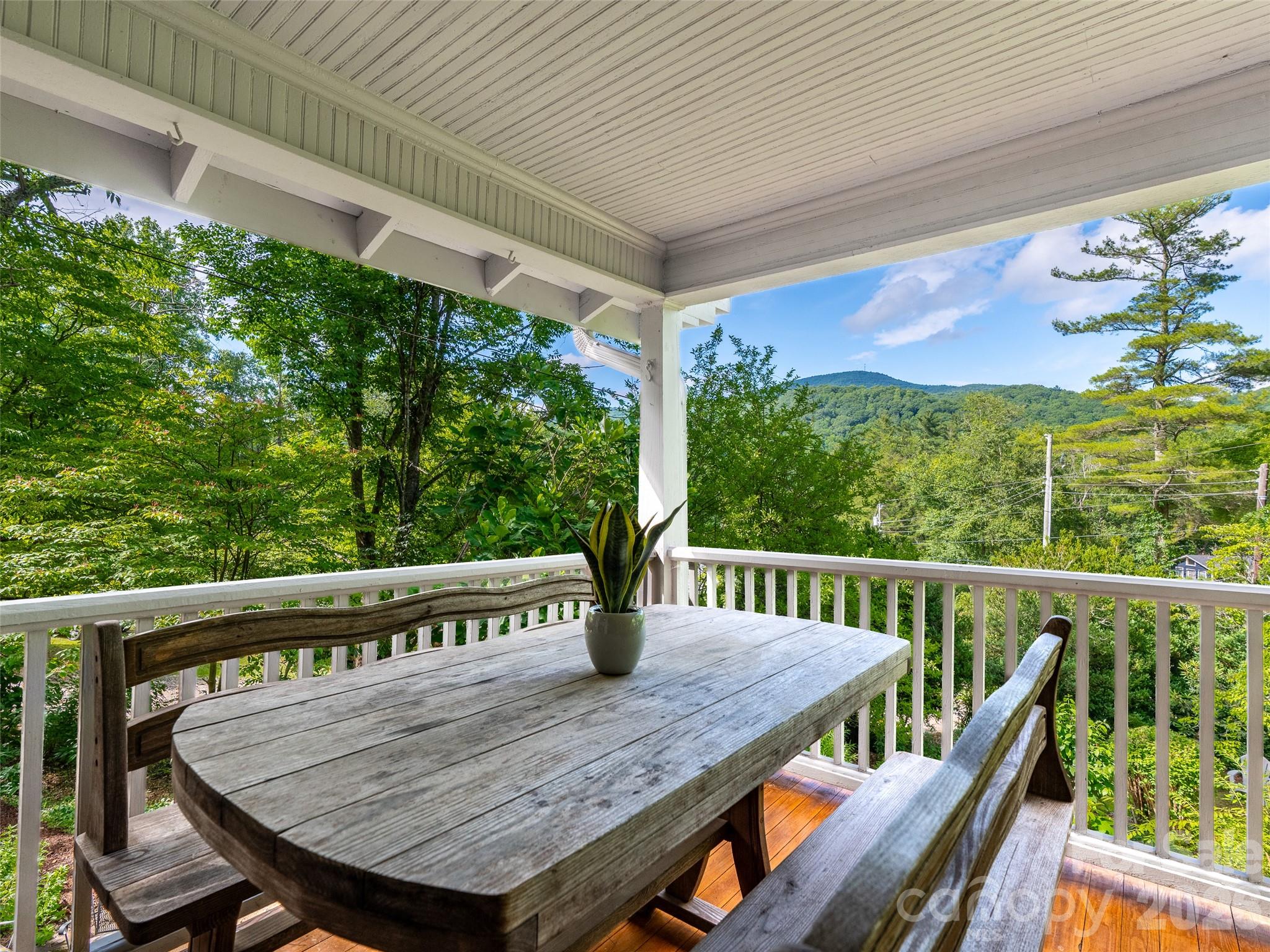 206 Chestnut Hill Road Gerton, NC 28735 - Photo 23 of 48 a view of a two chairs in the deck