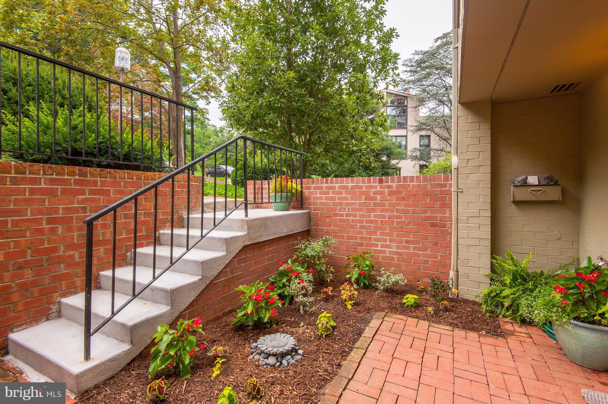 11430 Waterview Cluster Reston, VA 20190 - Photo 3 of 30 Brick Patio and Garden