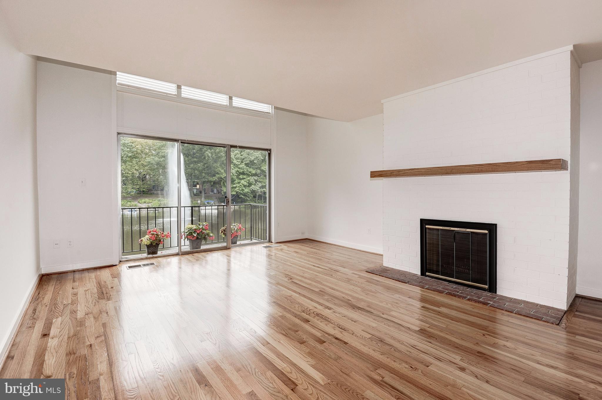 11430 Waterview Cluster Reston, VA 20190 - Photo 9 of 30 Living Room fireplace