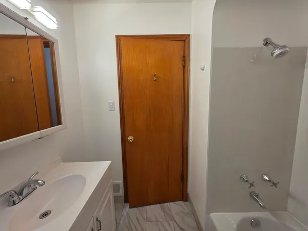 a bathroom with a bathtub
