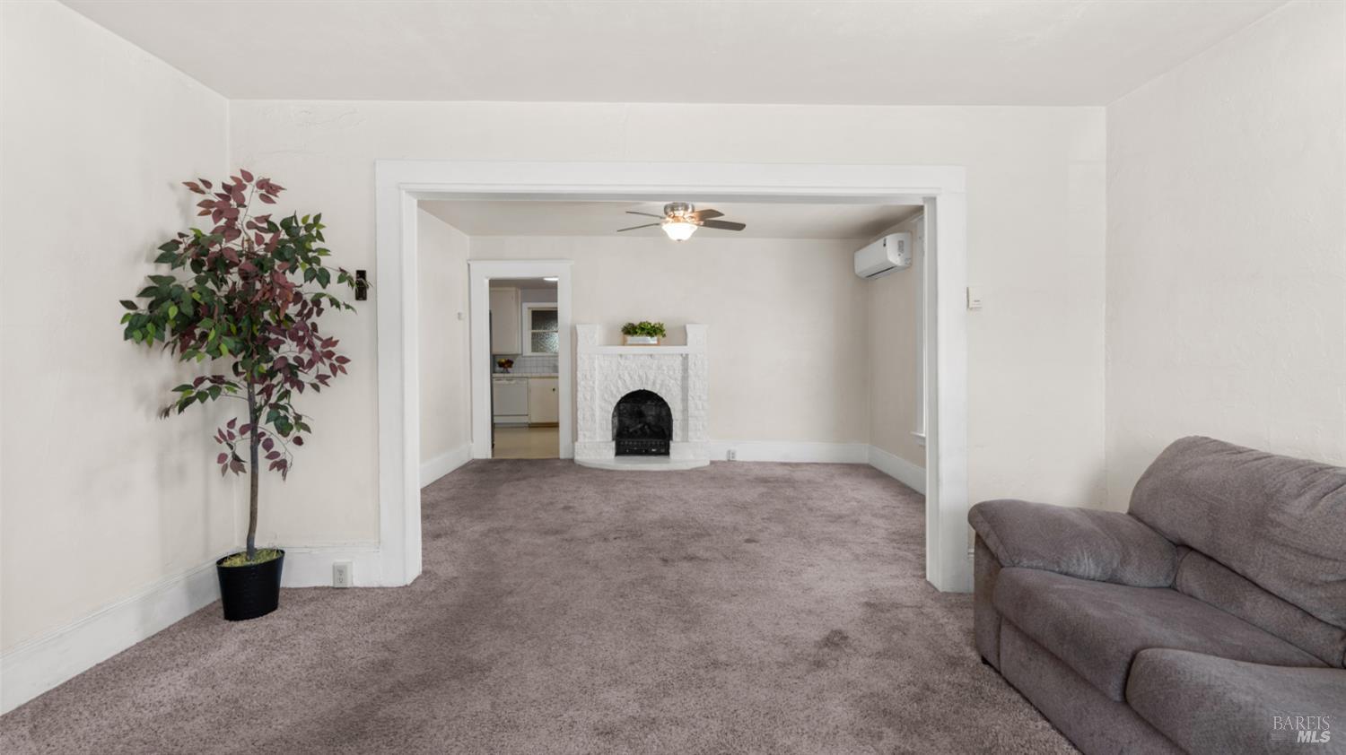 125 Kendal Street Vacaville, CA 95688 - Photo 9 of 45 a living room with furniture and a potted plant