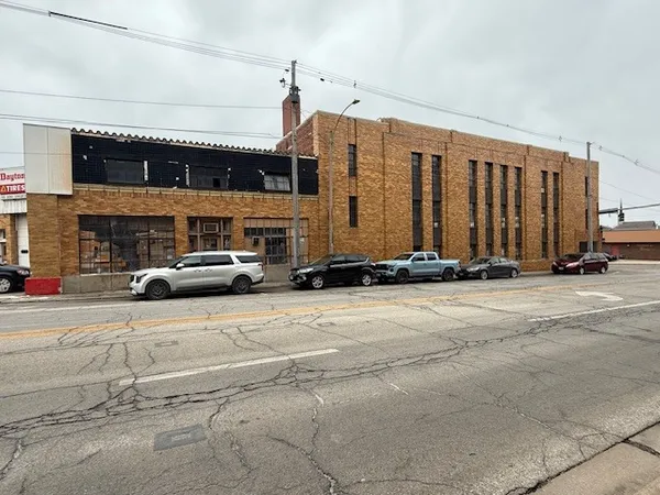 a car parked in front of a building