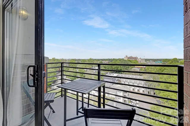 a view of a chairs and table on the terrace