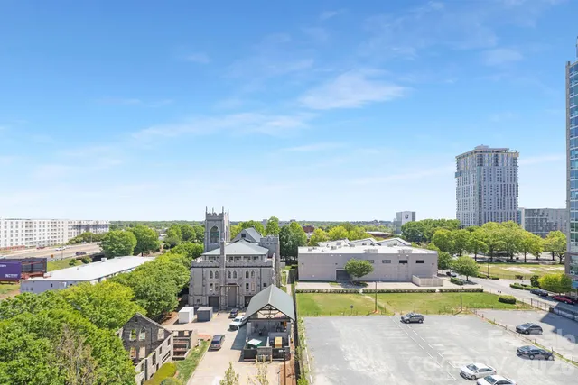 a view of a city with tall buildings