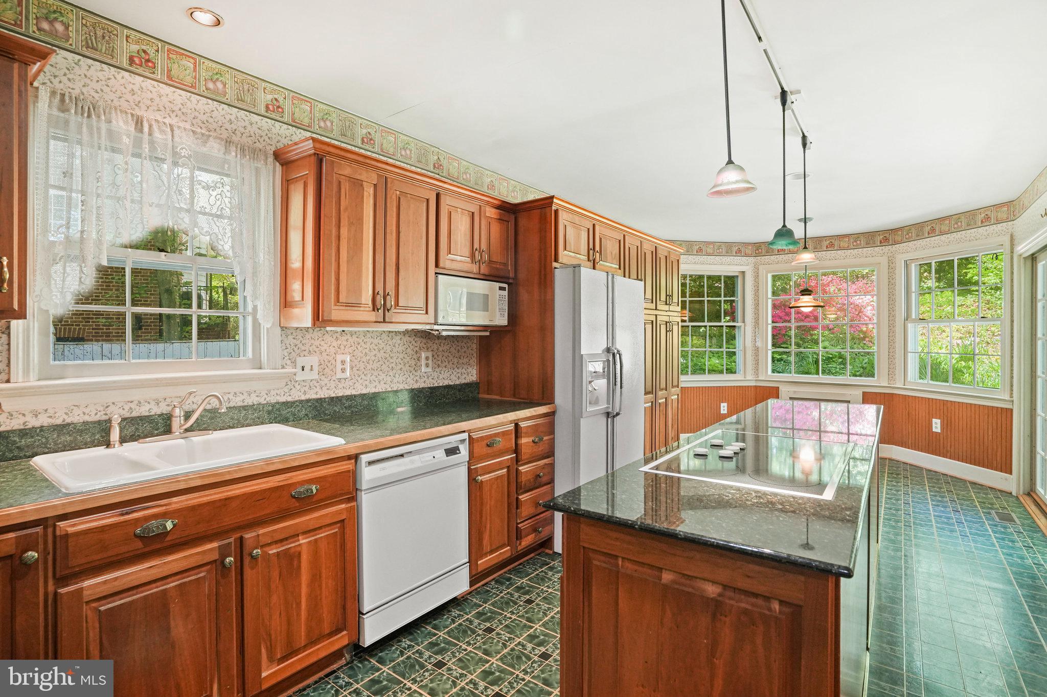 6900 Wake Forest Drive College Park, MD 20740 - Photo 12 of 50 Kitchen with large island