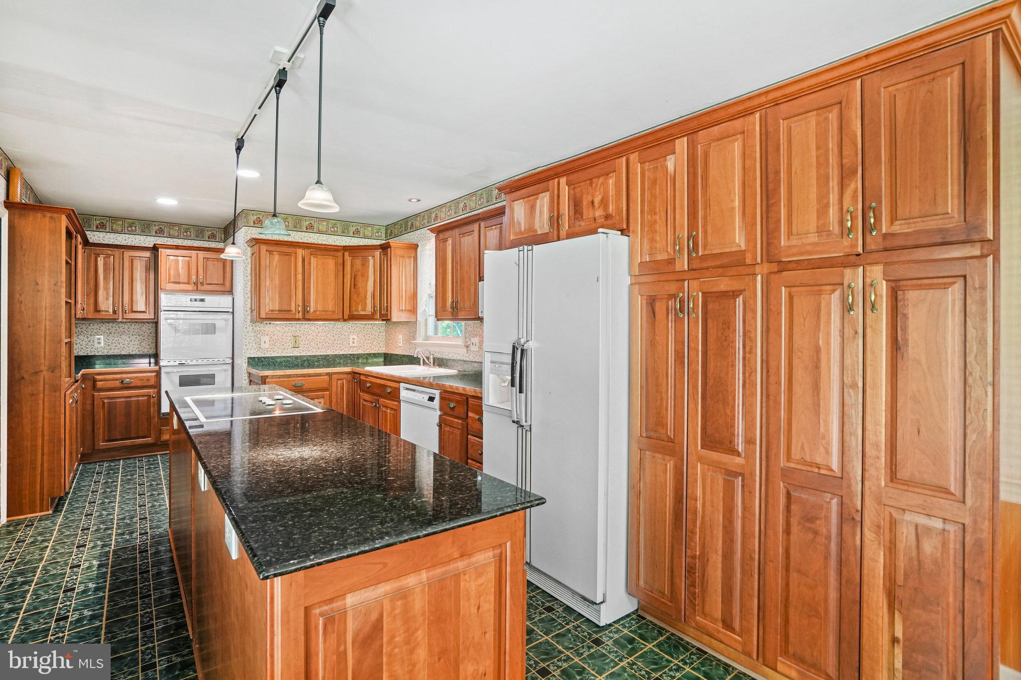6900 Wake Forest Drive College Park, MD 20740 - Photo 15 of 50 Plenty of cabinets and storage in the kitchen