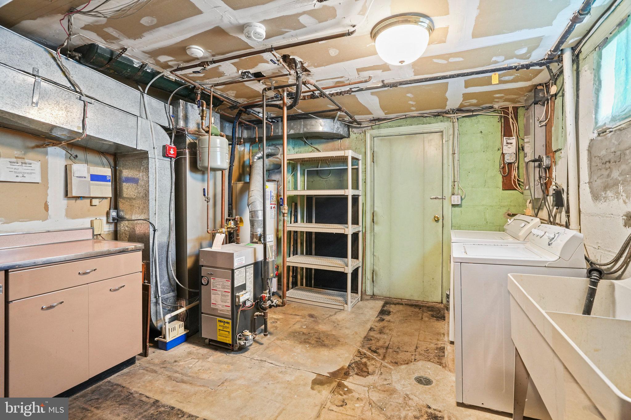 6900 Wake Forest Drive College Park, MD 20740 - Photo 38 of 50 Basement laundry / utility / storage room