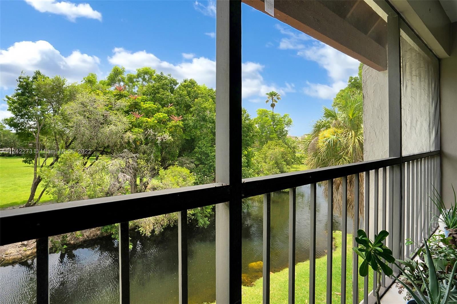 303 Racquet Club Road, Unit 307 Weston, FL 33326 - Photo 11 of 22 a view of a balcony