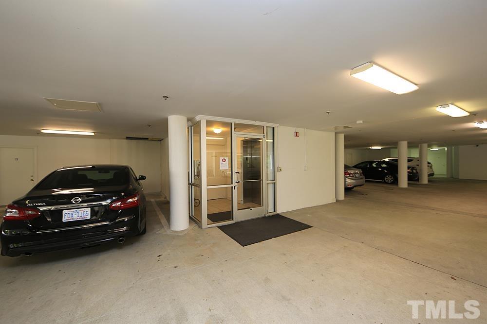 100 Northbrook Drive, Unit 203 Raleigh, NC 27609 - Photo 30 of 39 a view of car garage