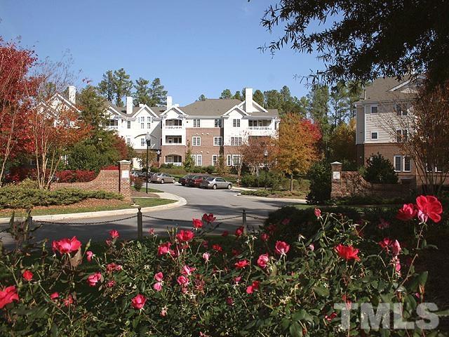 100 Northbrook Drive, Unit 203 Raleigh, NC 27609 - Photo 4 of 39 a view of street with flower on side of it
