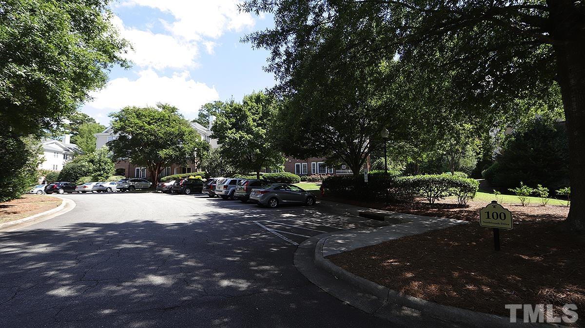 100 Northbrook Drive, Unit 203 Raleigh, NC 27609 - Photo 5 of 39 a view of a street with some trees