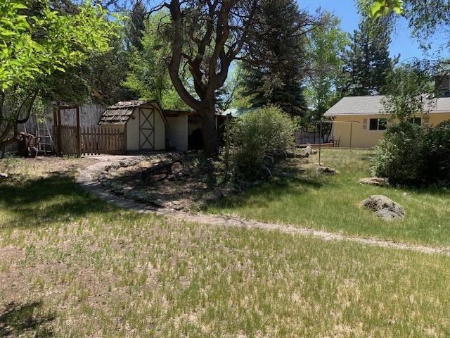 570 Southwest 2nd Court Cedaredge, CO 81413 - Photo 25 of 32 a front view of a house with garden