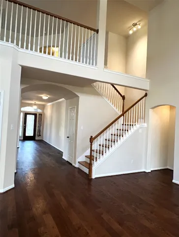 a view of a kitchen with a sink and a living room