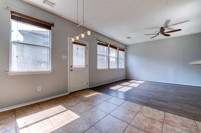a view of an empty room and window