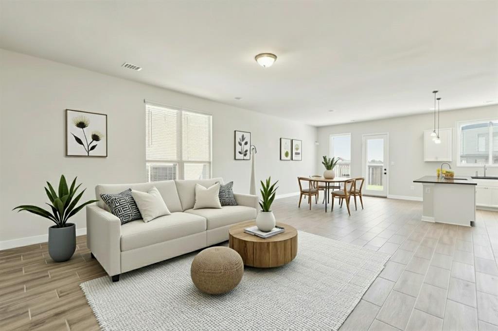 1222 El Sol Boulevard Sherman, TX 75090 - Photo 1 of 39 a living room with furniture and wooden floor