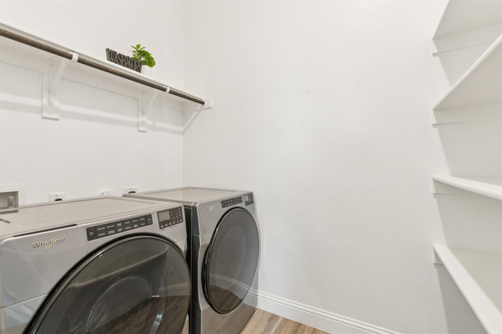 1222 El Sol Boulevard Sherman, TX 75090 - Photo 13 of 39 a utility room with dryer and washer