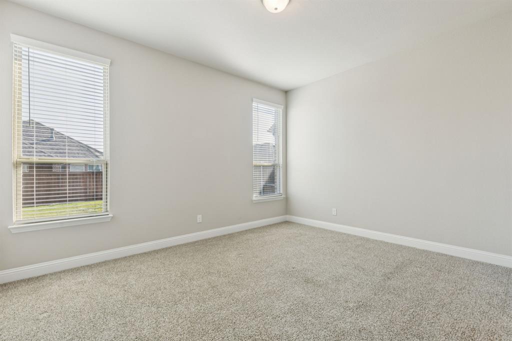 1222 El Sol Boulevard Sherman, TX 75090 - Photo 15 of 39 a view of an empty room with a window