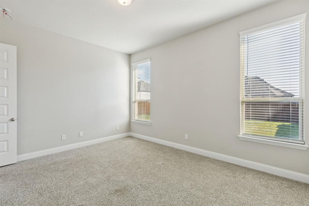 1222 El Sol Boulevard Sherman, TX 75090 - Photo 17 of 39 an empty room with a window