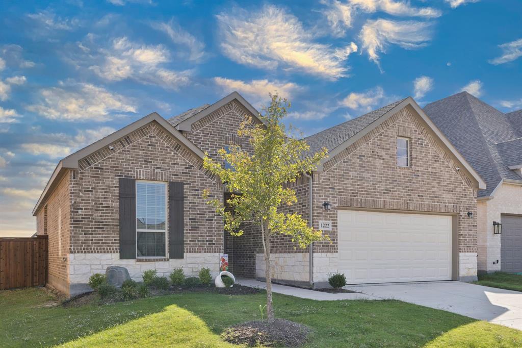1222 El Sol Boulevard Sherman, TX 75090 - Photo 2 of 39 a view of a house with a yard