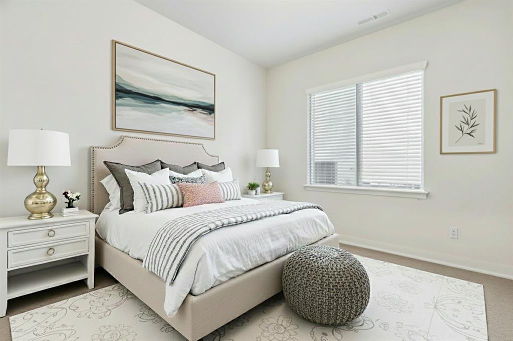 1222 El Sol Boulevard Sherman, TX 75090 - Photo 24 of 39 a bedroom with a bed and a couch