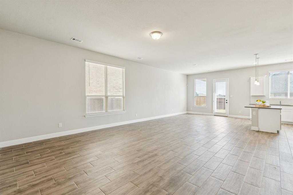 1222 El Sol Boulevard Sherman, TX 75090 - Photo 3 of 39 a view of an empty room with glass door and entryway
