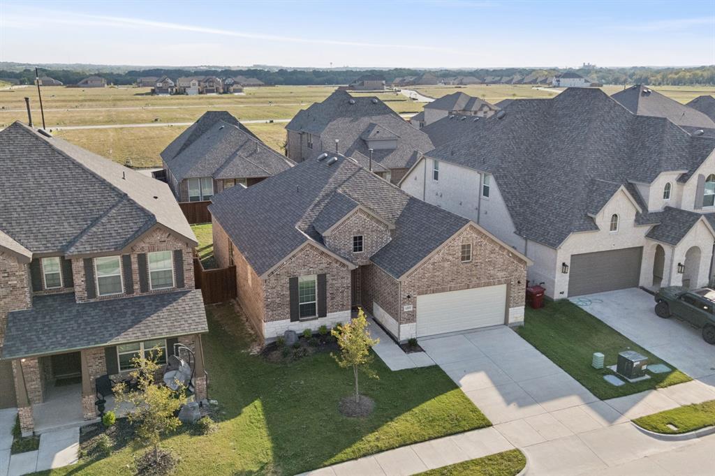 1222 El Sol Boulevard Sherman, TX 75090 - Photo 31 of 39 an aerial view of a house with a garden