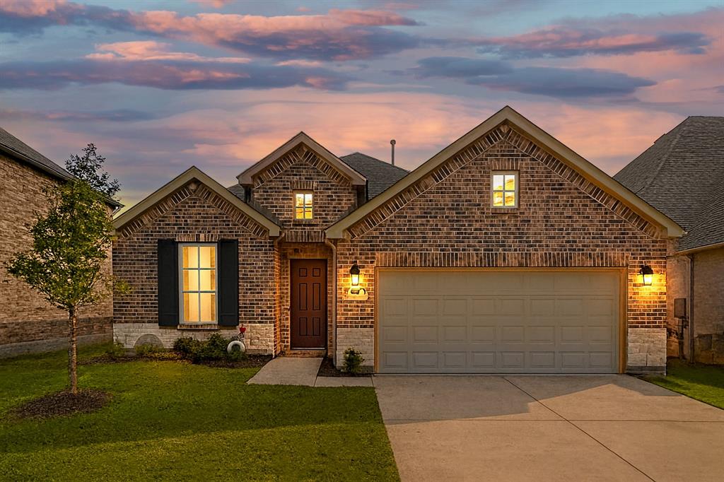1222 El Sol Boulevard Sherman, TX 75090 - Photo 35 of 39 a front view of a house with a yard