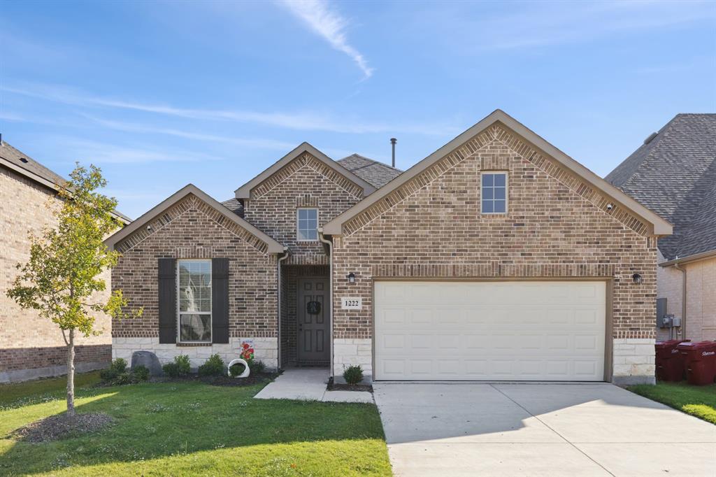 1222 El Sol Boulevard Sherman, TX 75090 - Photo 36 of 39 a front view of a house with garden