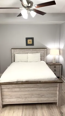 a view of a hallway with windows