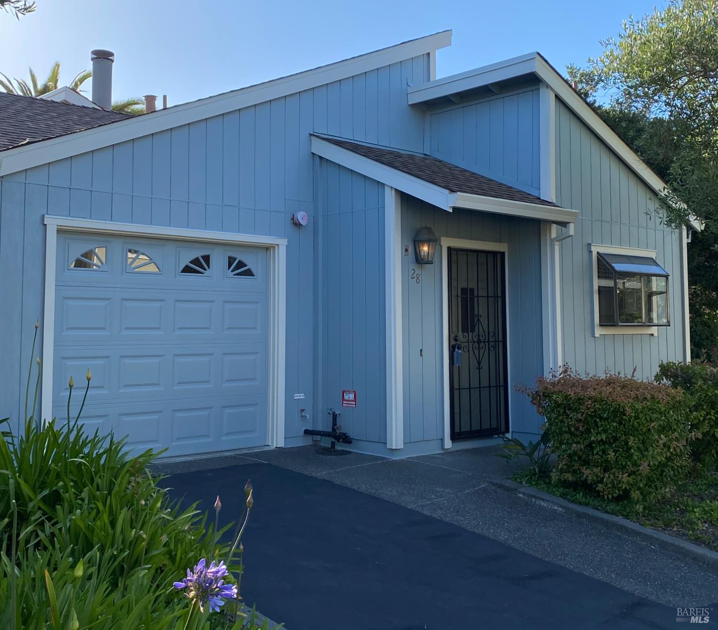 a view of a house with a garage