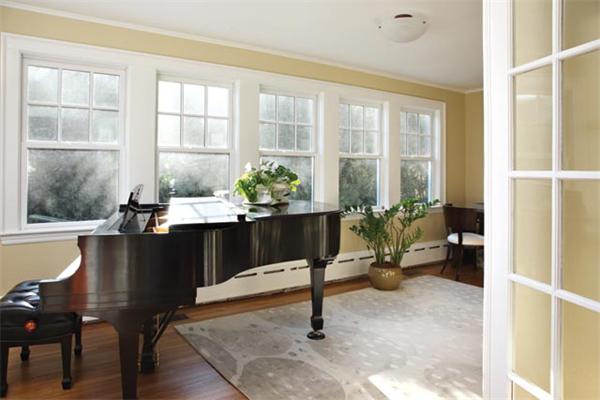 151 Plymouth Road Newton, MA 02461 - Photo 7 of 12 a living room with furniture and a large window