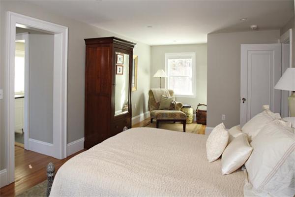 151 Plymouth Road Newton, MA 02461 - Photo 9 of 12 a bedroom with a bed and a window
