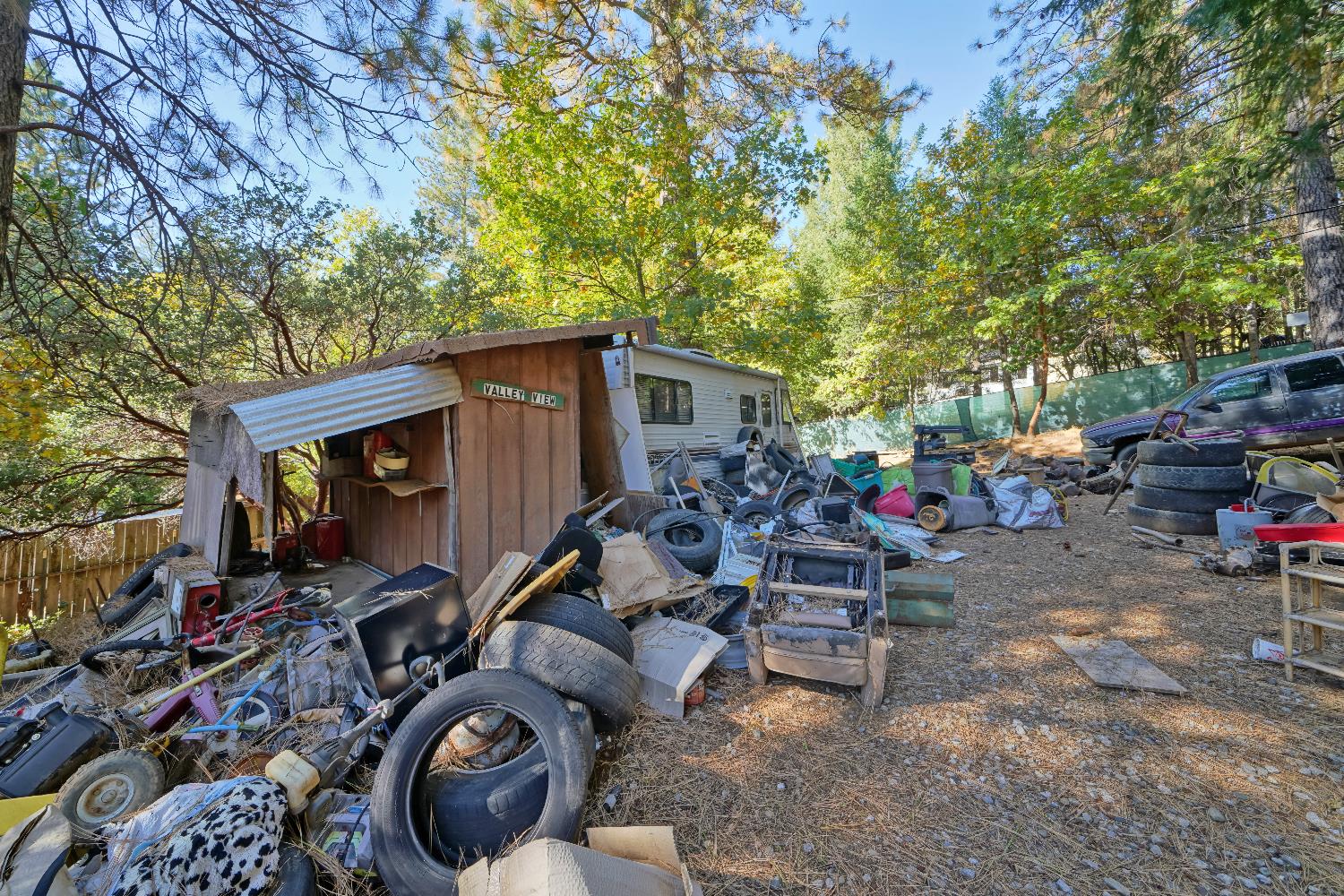 6128 Scott Road Placerville, CA 95667 - Photo 13 of 13 a view of a patio with table and chairs and potted plants