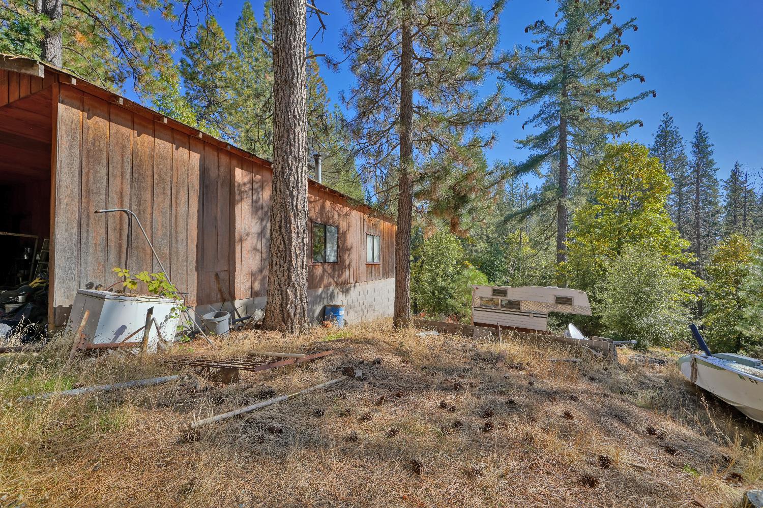 6128 Scott Road Placerville, CA 95667 - Photo 7 of 13 a backyard of a house with table and chairs