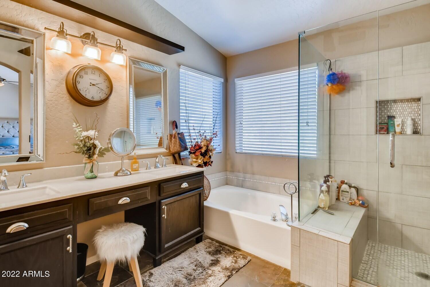 689 South Dodge Street Gilbert, AZ 85233 - Photo 14 of 28 a bath room with a sink and a large mirror