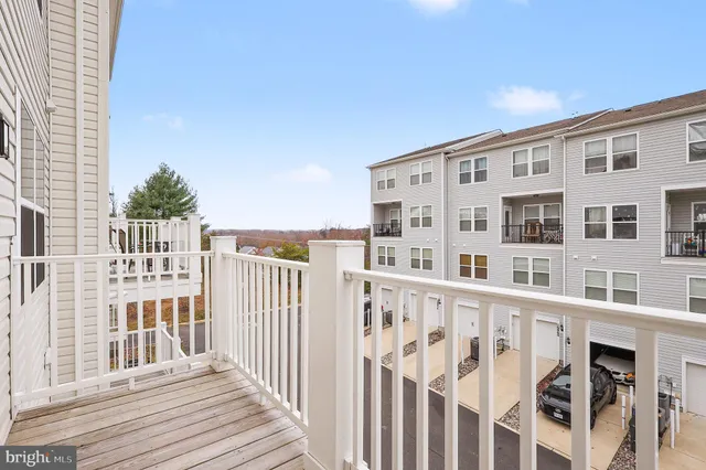 a view of a large building with wooden floor