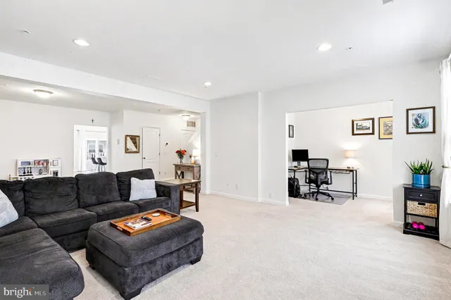 a living room with furniture and a couch