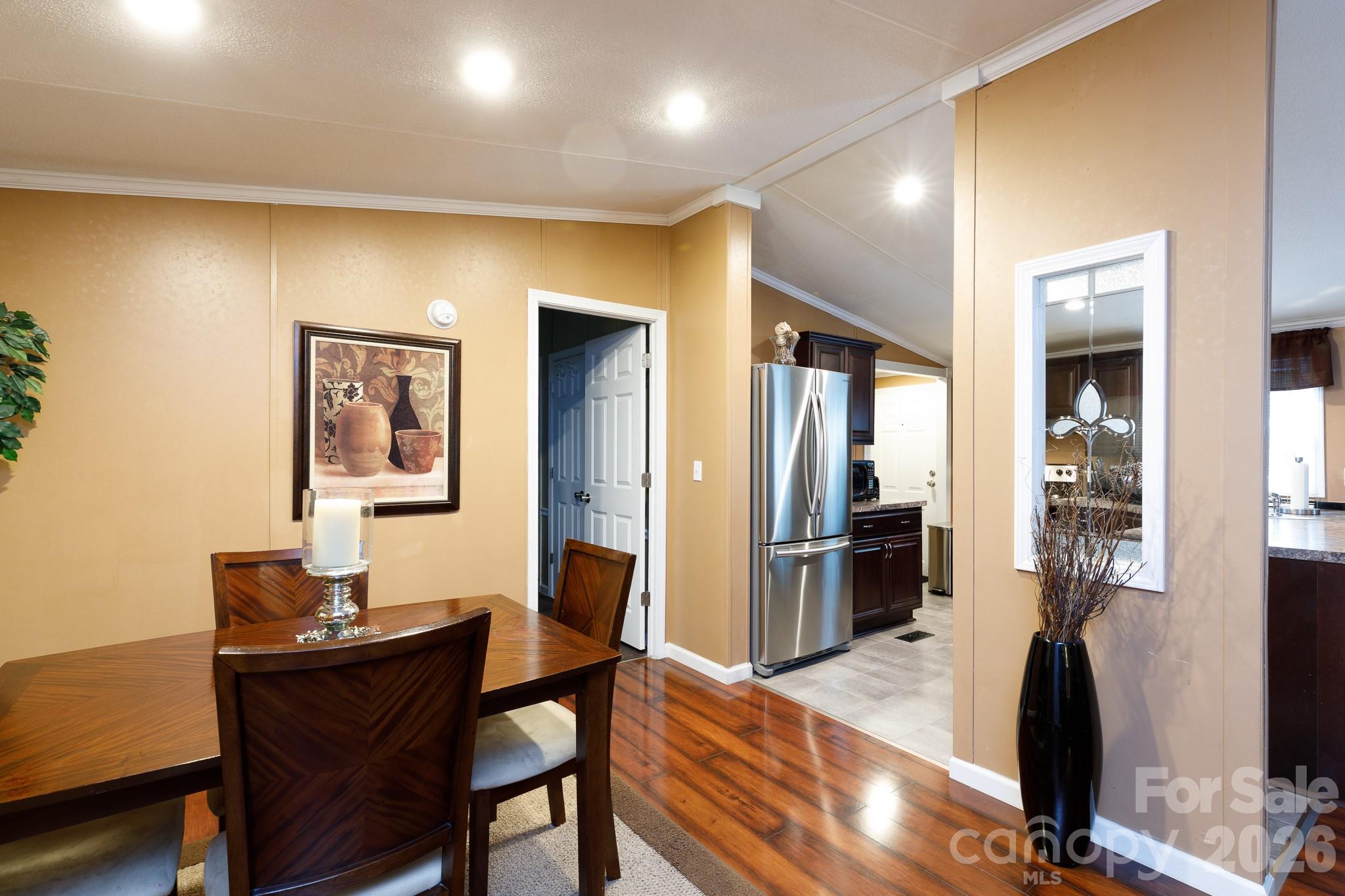 652 Sutton Spring Road York, SC 29745 - Photo 6 of 28 a view of a dining room with furniture
